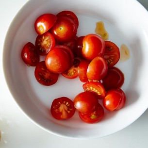 This lovely photo of perfectly sliced cherry tomatoes is by James Ransom via Food52.