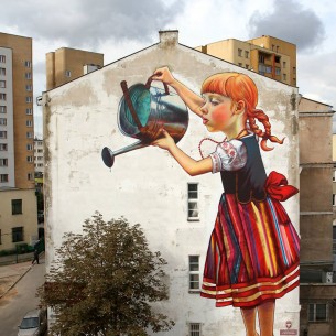 A wall mural girl waters a real tree in Poland. Photo by Natalia Rak on BoredPanda.com
